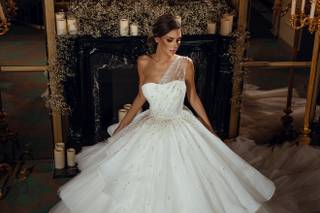 abito da sposa monospalla con gonna a principessa