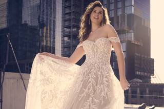 Abito da sposa boho chic con decorazioni in pizzo