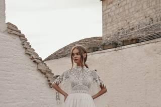 Abito da sposa vintage in macramè con strascico