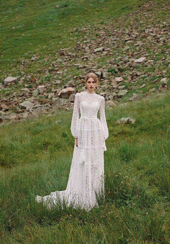 abito da sposa vintage tutto in rpizzo con maniche lunghe e gonna scivolata