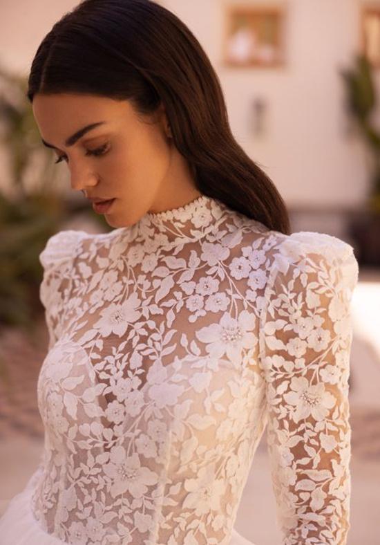 abito da sposa vintage con maniche in pizzo a sbuffo