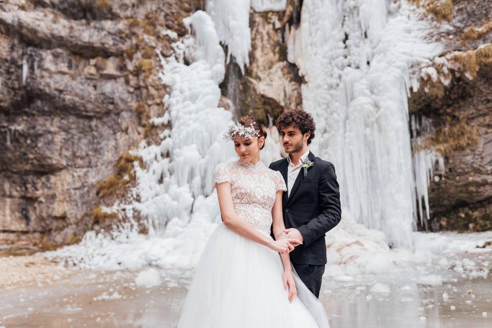servizio fotografico sposi durante matrimonio sulla neve
