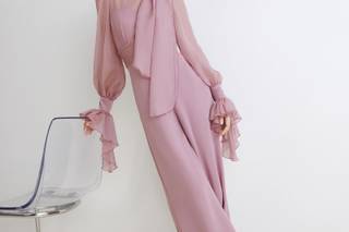 jumpsuit elegante da cerimonia, rosa con maniche a sbuffo e volant