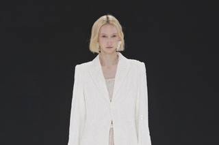 jumpsuit con pantalone a palazzo tempestata di brillanti con giacca bianca