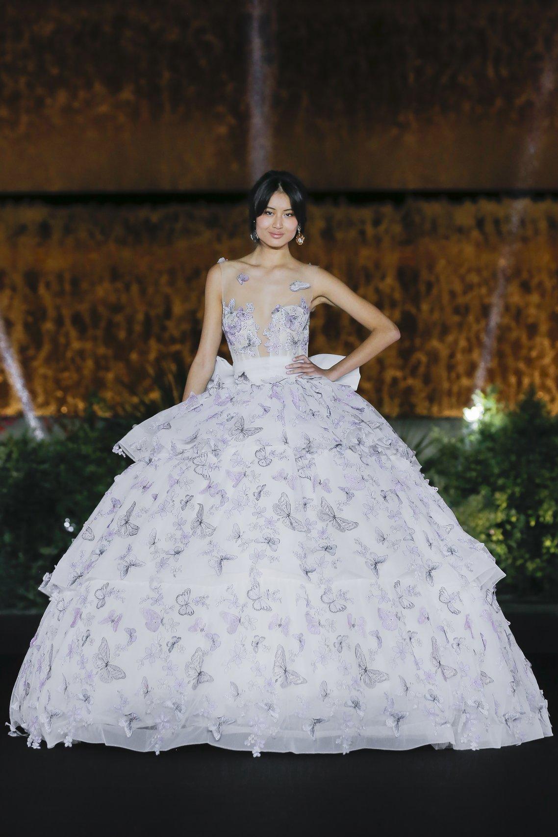 abiti da sposa con fiori e farfalle