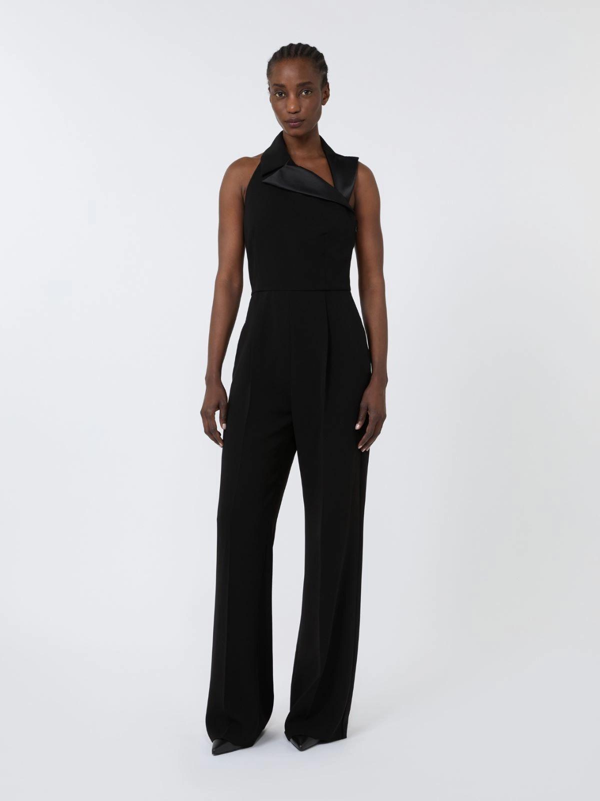 Tuta elegante da cerimonia nera smanicata con scollo all'americana e motivo a goccia, pantalone regular fit