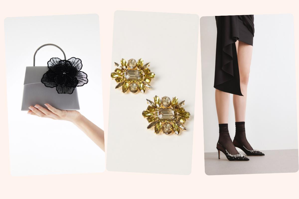 una borsa grigia con fiocco nero, un paio di orecchini oro e pietre e un paio di slingback con pietre per abito nero matrimonio