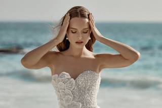 abito da sposa corto con perline e pietre