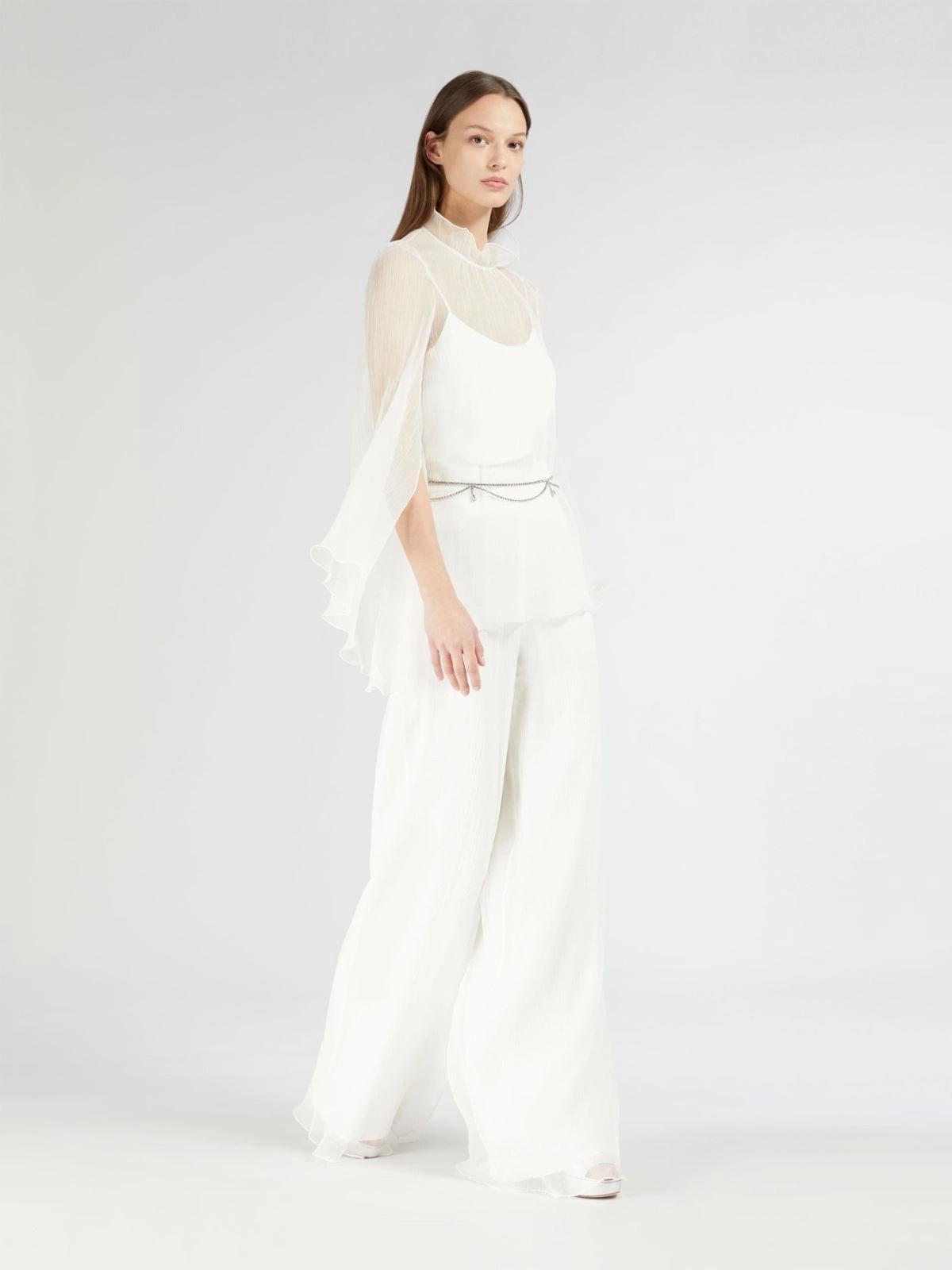 abito da sposa con pantaloni a palazzo e blusa trasparente con collo alto e maniche lunghe