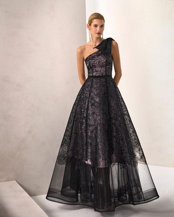 abito nero matrimonio con scollo asimmetrico e gonna ampia