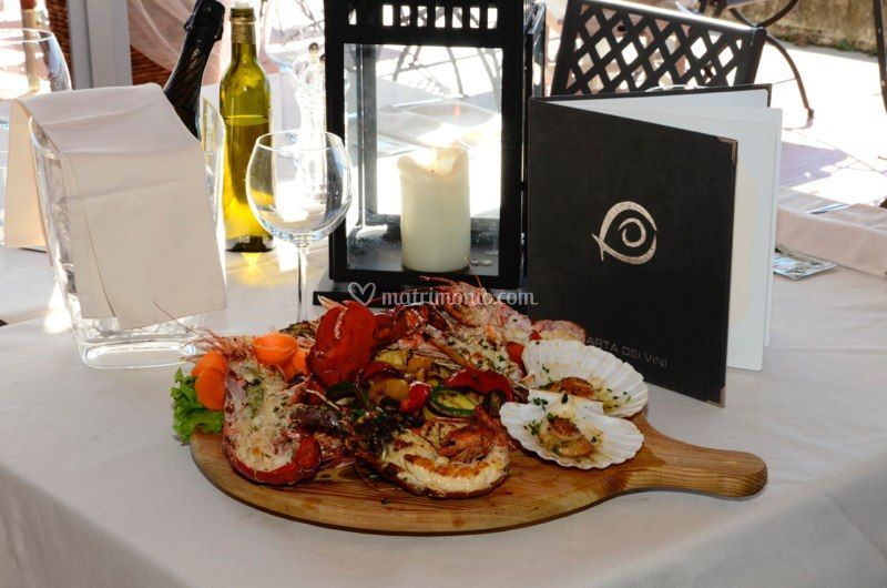 Piatti Di Pesce Di Ristorante Al Cason Foto 15