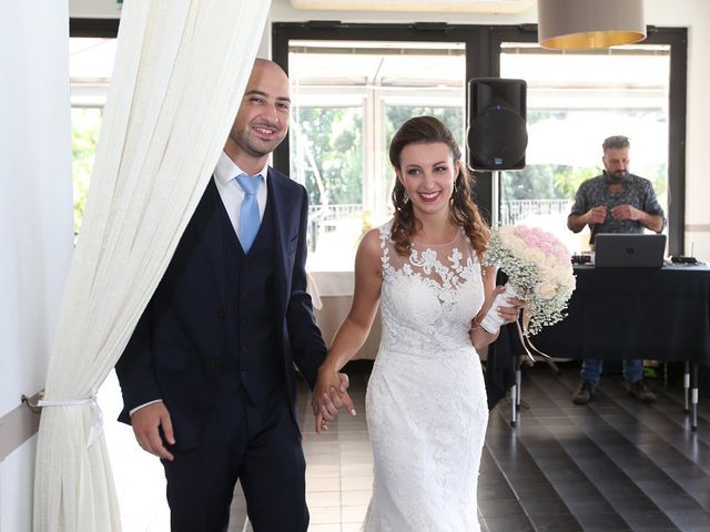 Il matrimonio di Giavid e Laura a Angera, Varese 9