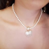 Collana di perle su abito sposa - 3