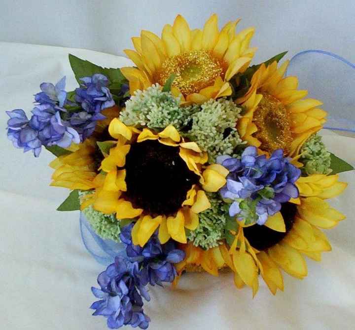 Bouquet di girasoli con un tocco di blu