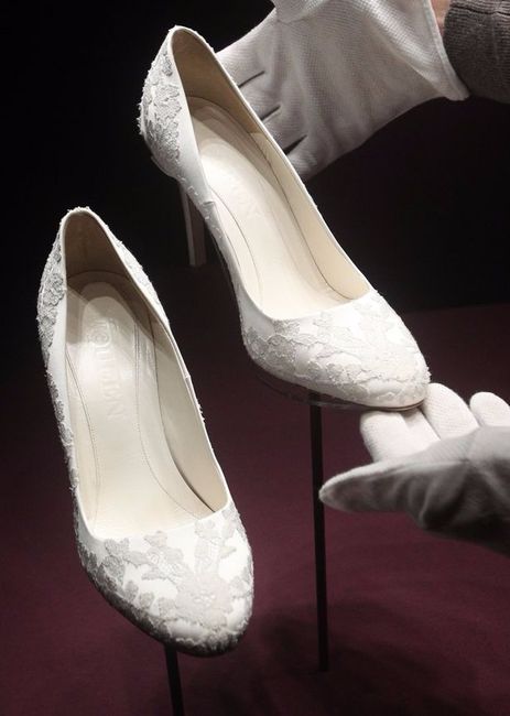 Kate's bridal shoes were also designed by Sarah Burton for McQueen and were made of ivory duchesse s