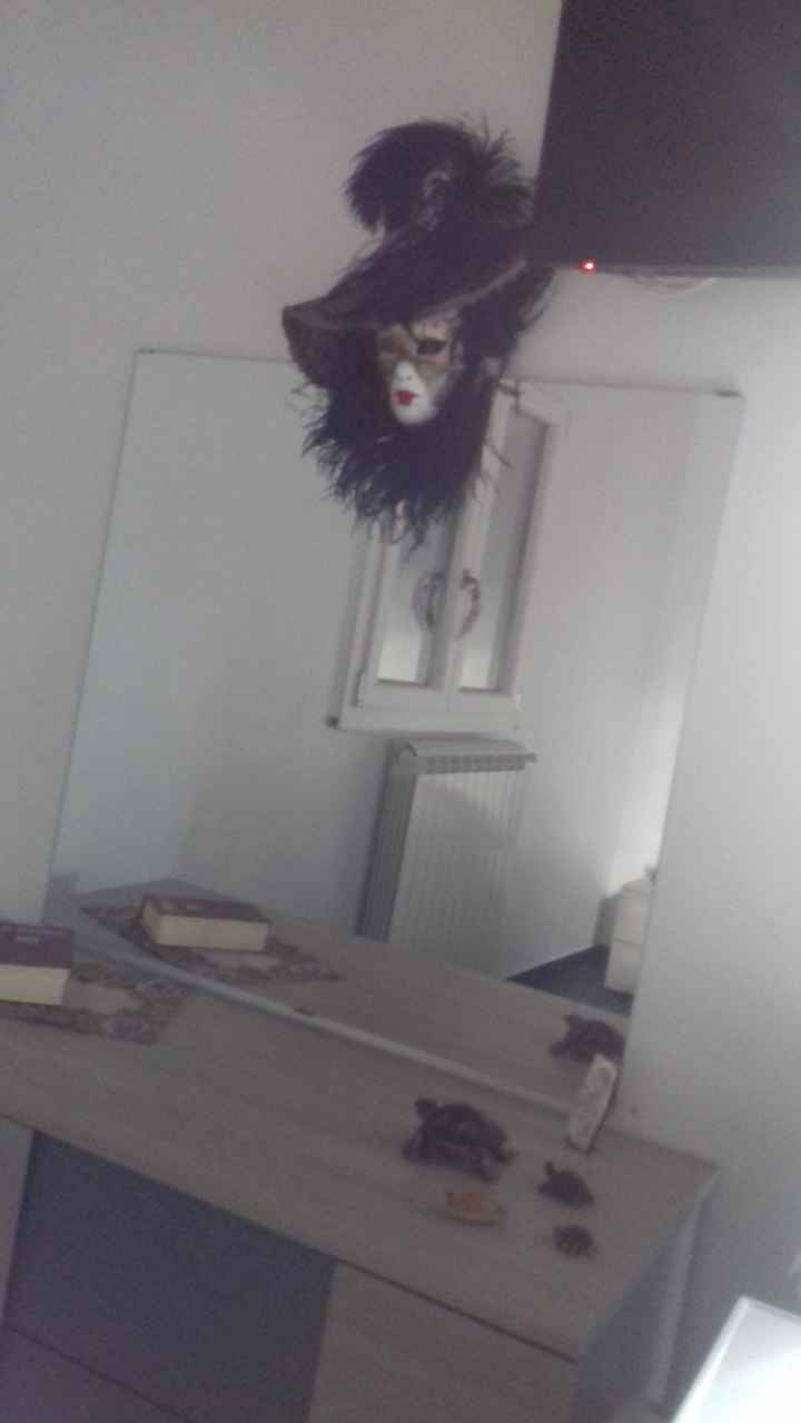 specchio da camera da letto  con anessa maschera veneziana