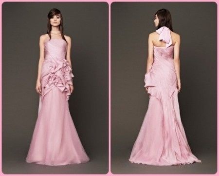 collezione 2015: Abito strapless a sirena con scollo a cuore impreziosito dal doppio fiocco sulla sc