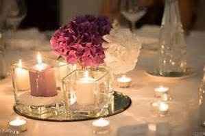 centrotavola candele e fiori