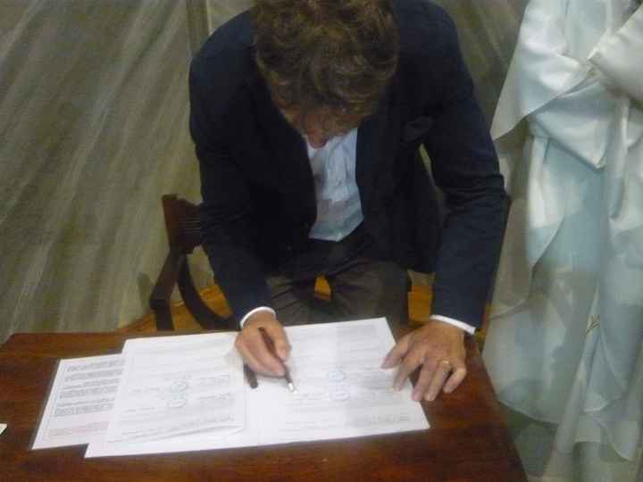 La firma del testimone