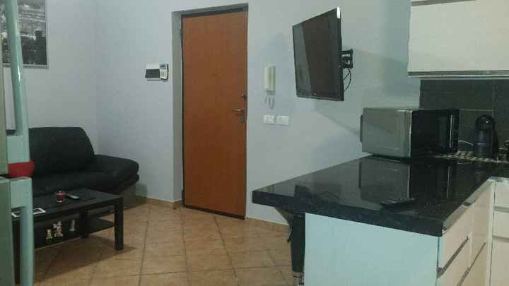 Disposizione cucina e soggiorno in open space - 1