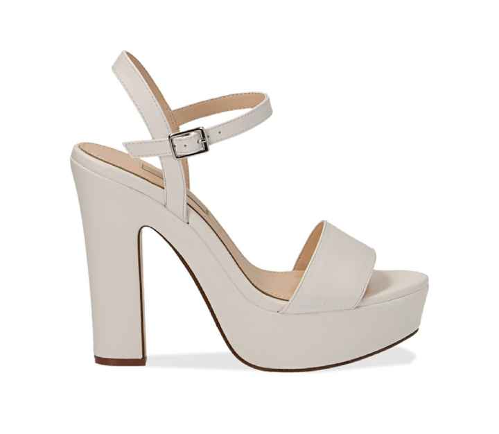 Che ne dite di queste scarpe ? - 1