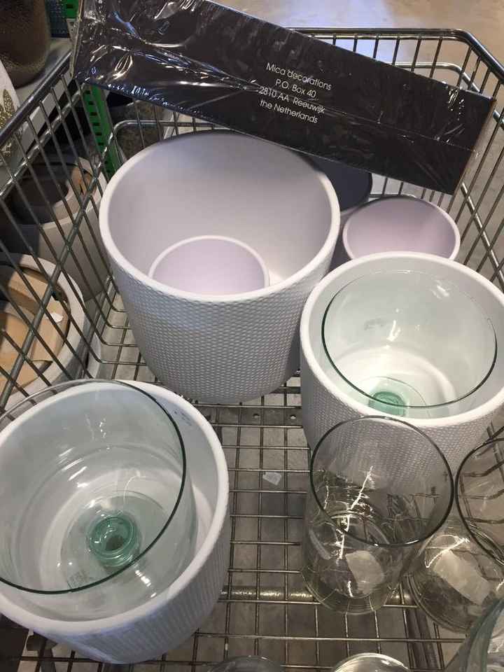 spesa di vasi e cilindri di vetro