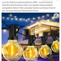 Catene luminose esterne sopra al tavolo - 1