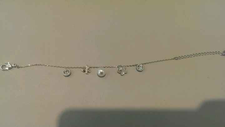 Che ne dite di questo bracciale e orecchini?? - 1