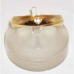 Fedi in oro giallo con brillante 