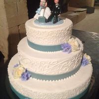 torta con cake topper con valigie 