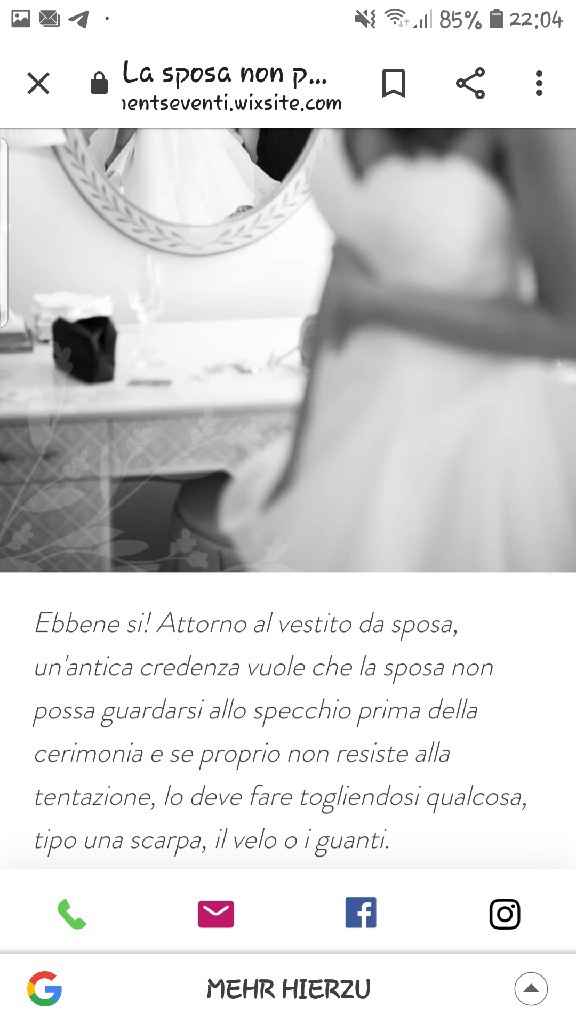 guardarsi allo specchio con l'abito da sposa il giorno delle nozze porta male? - 2