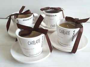 tazzina di caffè con candela