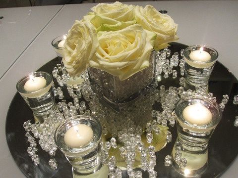 Centrotavola specchio e candele foto ricevimento di nozze for Candele matrimonio