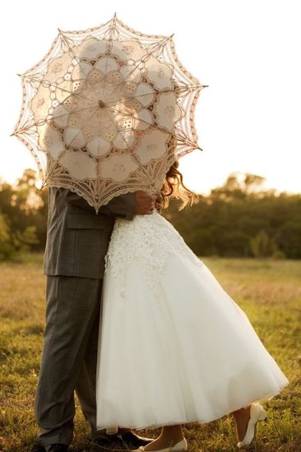 Foto sposi con ombrello parasole