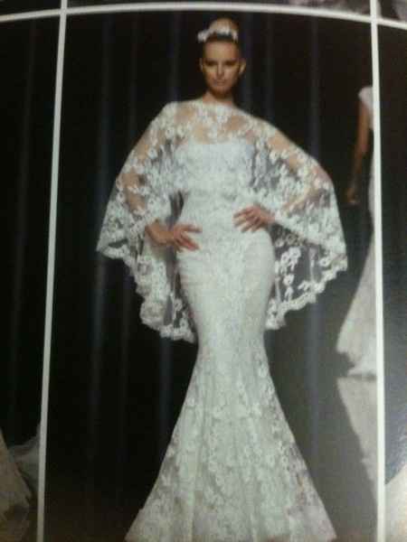 Non l'ho scelta ma questa mantella indossata è meravigliosa!!!