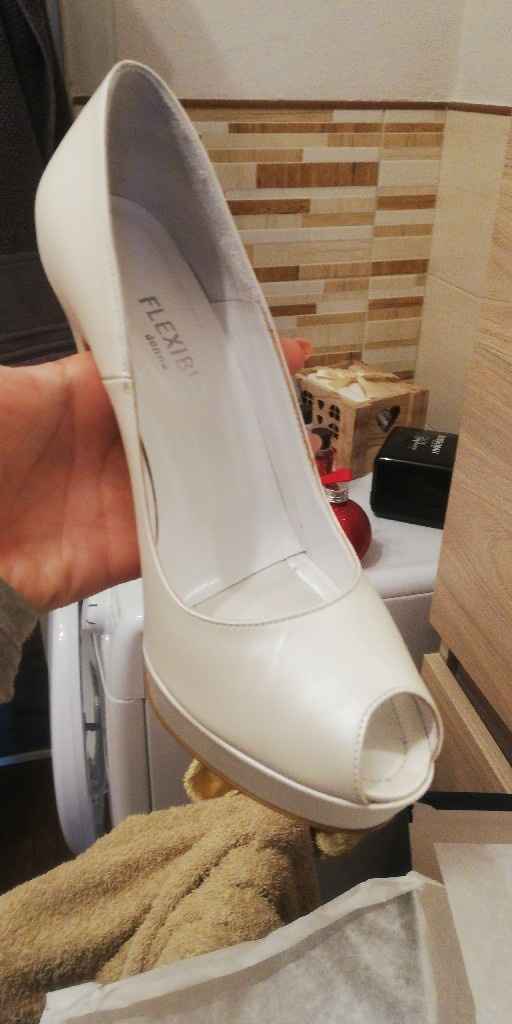 Quanto vi sono costate le scarpe da sposa? - 1