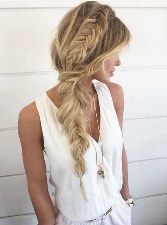 Acconciatura sposa boho chic con trecce