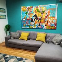 Arredamento soggiorno con quadro moderno