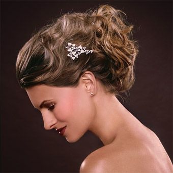 Acconciatura sposa capelli ricci