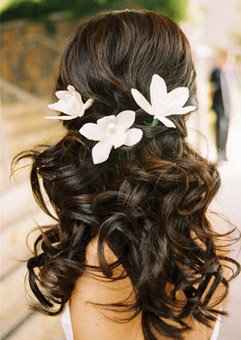 Acconciatura sposa capelli ricci