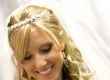 Acconciatura sposa con coroncina e velo