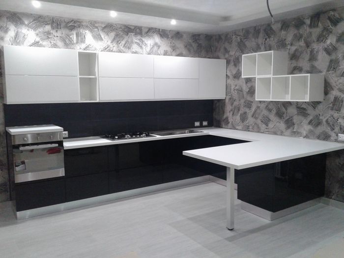 Cucina ad angolo e con penisola - 1