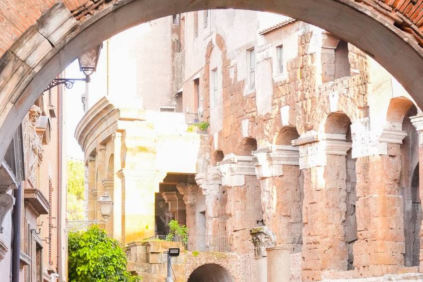 Lovers through ancient alleys.