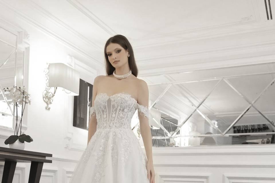 Abito sposa linea A in pizzo