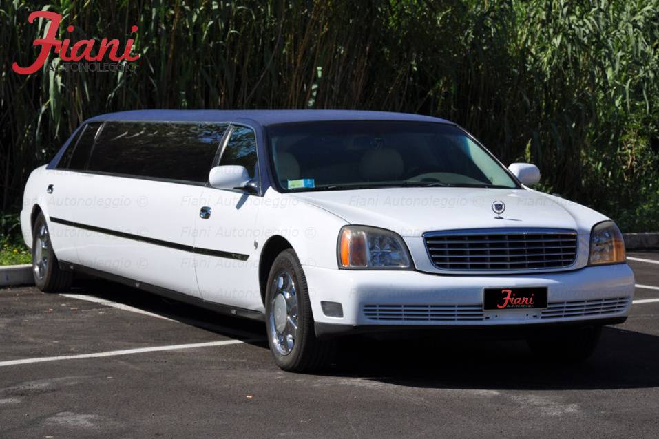 Limousine cadillac  (interni in pelle bianca/grigio)