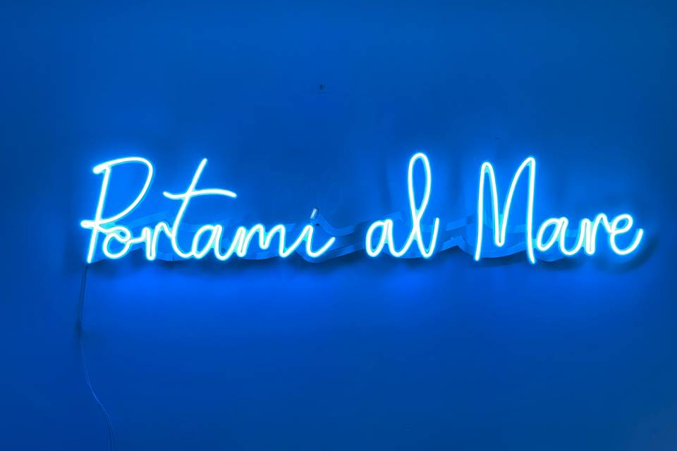 Scritta Portami al Mare