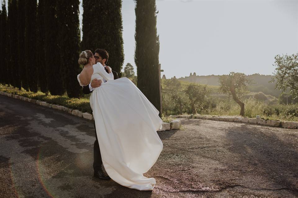 Embrace at sunset in chianti