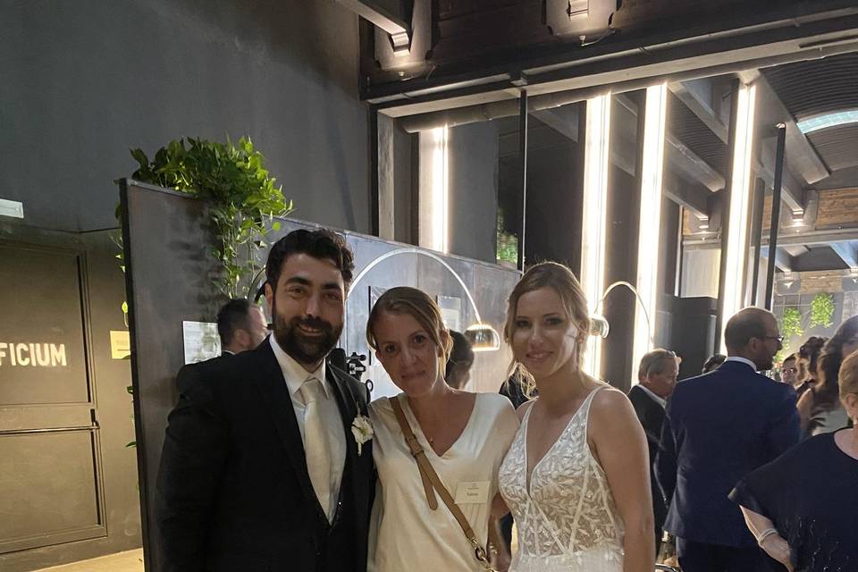 With Bride and Groom