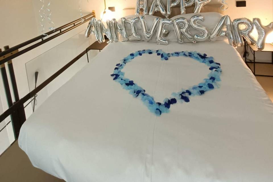 Allestimento romantico camera