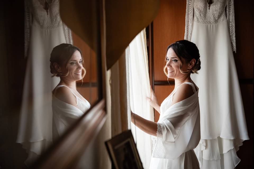 Riflessi Sposa alla finestra